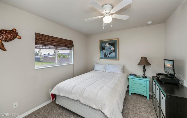 bedroom with carpet, ceiling fan, and baseboards