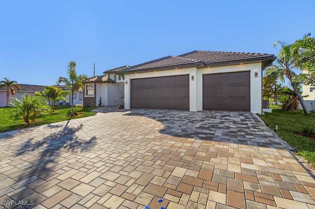 view of front of house with a garage