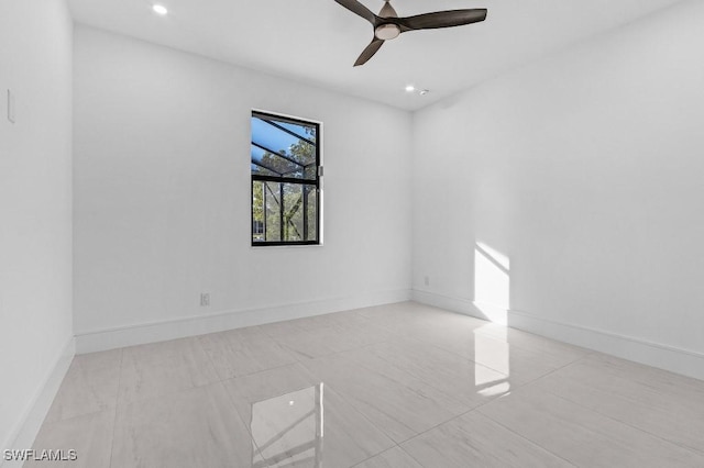 spare room with ceiling fan