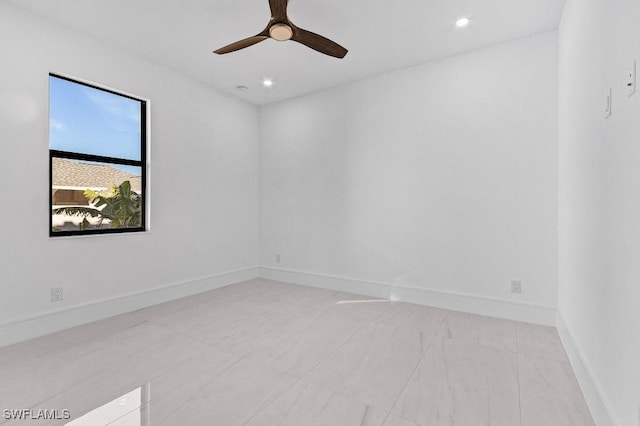 empty room featuring ceiling fan