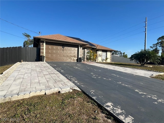 view of side of home featuring a garage