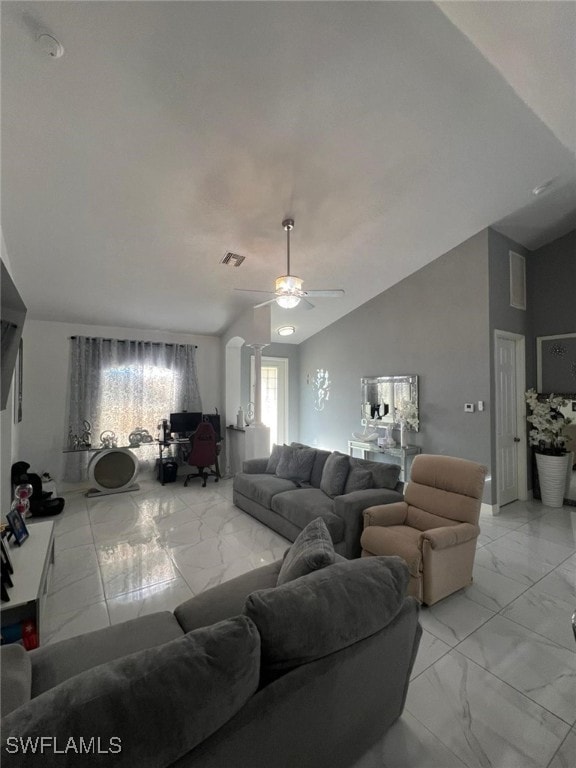 living room featuring lofted ceiling and ceiling fan