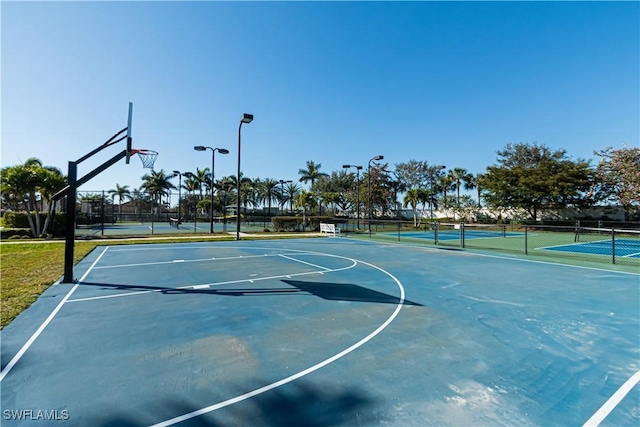 view of sport court with tennis court