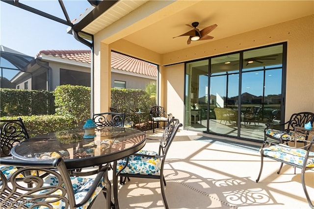 view of patio / terrace featuring ceiling fan