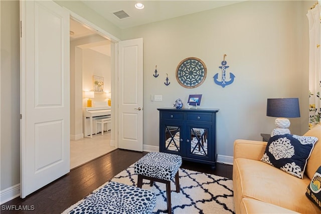 living room featuring dark hardwood / wood-style flooring