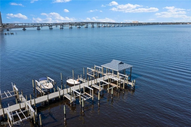 2711 1st St Unit 304, Fort Myers, FL 33916 - dock area featuring boat lift and a water view