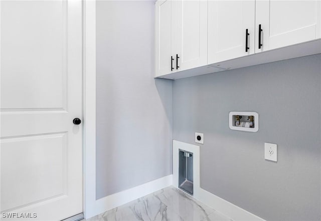 laundry room with hookup for a washing machine, cabinets, and hookup for an electric dryer