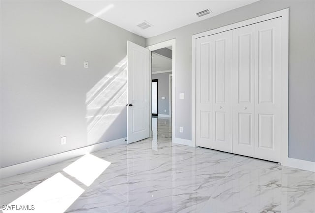 unfurnished bedroom featuring a closet