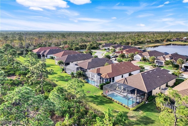 bird's eye view with a water view