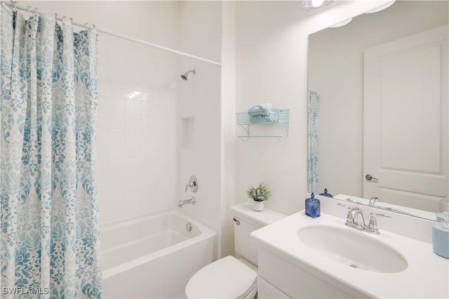 full bathroom with vanity, toilet, and shower / tub combo with curtain