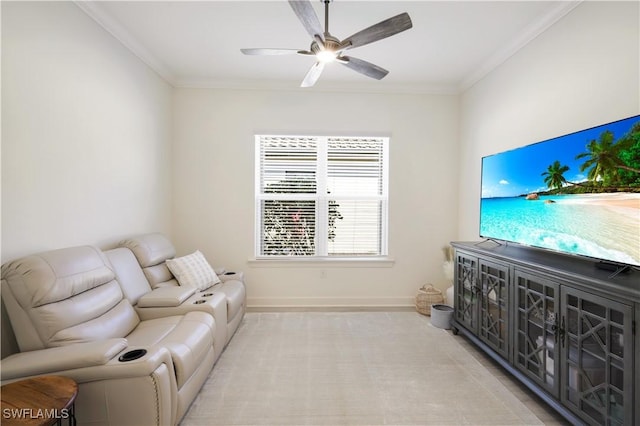 living room featuring ceiling fan and ornamental molding