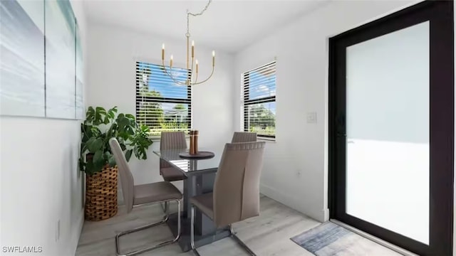 dining room with a notable chandelier