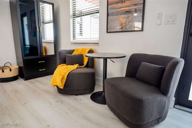 sitting room with wood finished floors