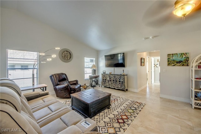 living room featuring lofted ceiling