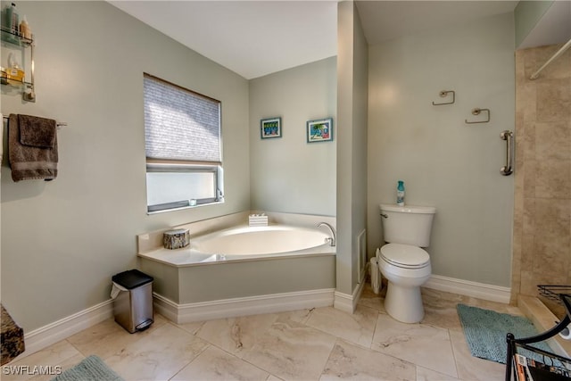 bathroom with separate shower and tub and toilet