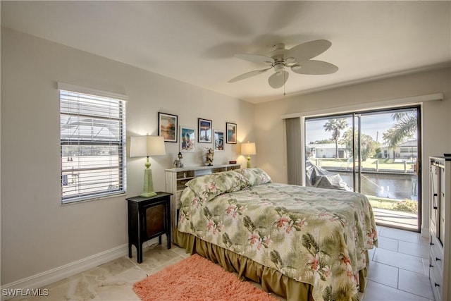 bedroom featuring access to exterior and ceiling fan