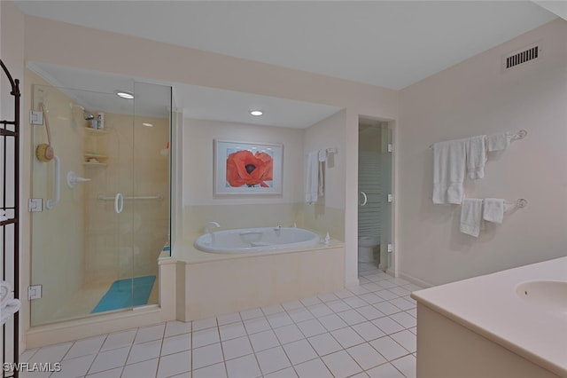 bathroom featuring vanity, tile patterned floors, and independent shower and bath