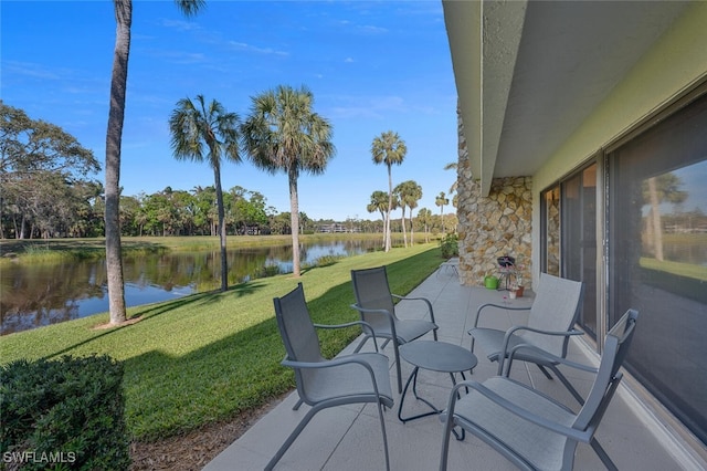 view of patio / terrace with a water view