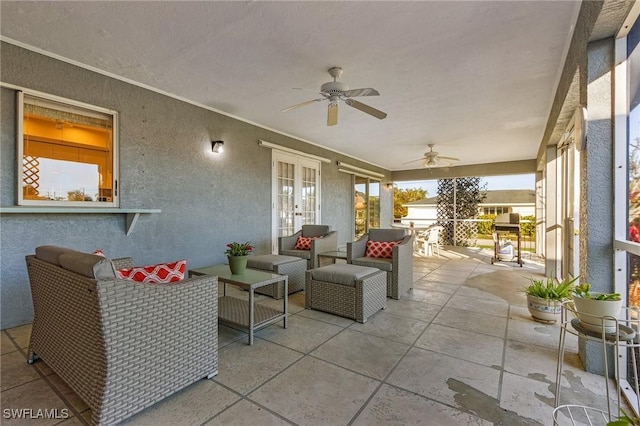 view of patio featuring an outdoor hangout area and ceiling fan