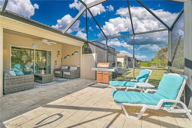 view of patio / terrace featuring ceiling fan, a grill, a lanai, and an outdoor hangout area