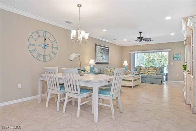 tiled dining room featuring ornamental molding and ceiling fan with notable chandelier