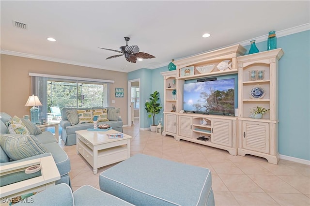 living room with crown molding and light tile patterned flooring