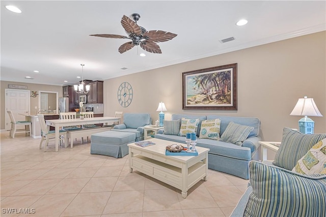 tiled living room featuring crown molding and ceiling fan with notable chandelier