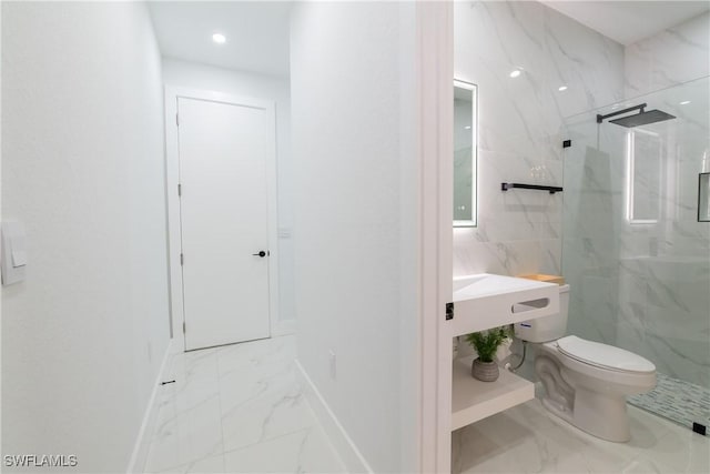 bathroom with vanity, toilet, and an enclosed shower