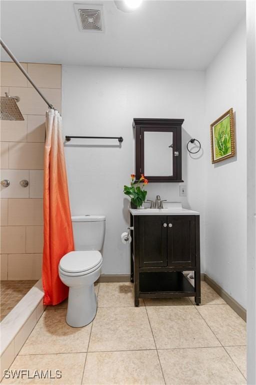 bathroom featuring vanity, toilet, tile patterned flooring, and a shower with shower curtain