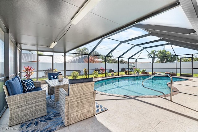 view of pool with a lanai, an outdoor hangout area, and a patio