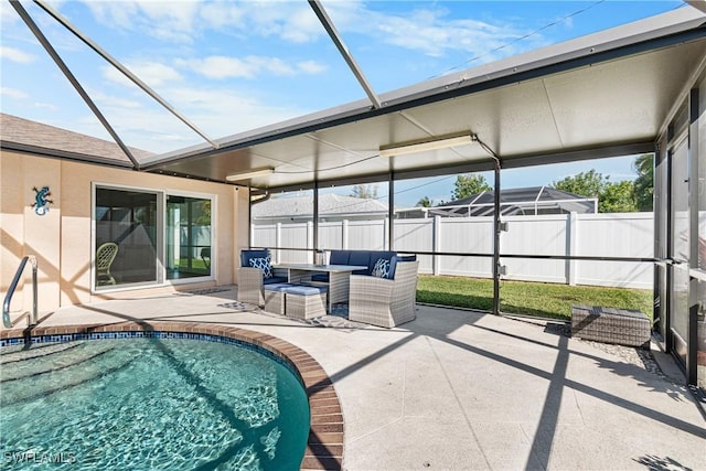 unfurnished sunroom with a hot tub