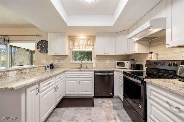 kitchen featuring electric stove, sink, dishwasher, white cabinets, and a raised ceiling