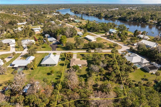 drone / aerial view with a water view