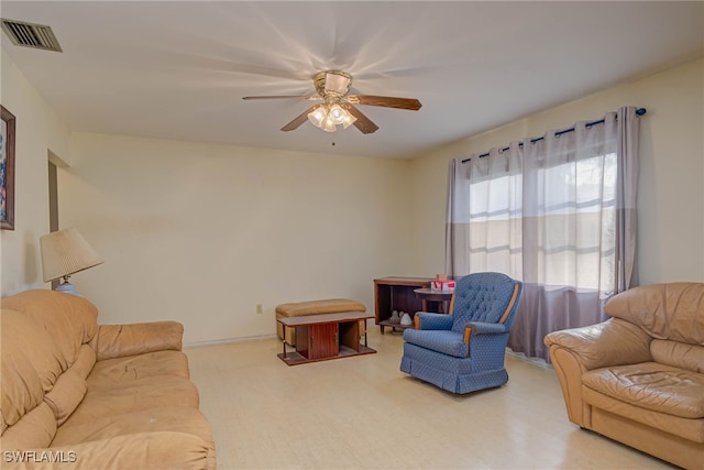 living room with ceiling fan