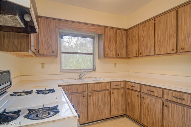 kitchen featuring sink and gas range gas stove