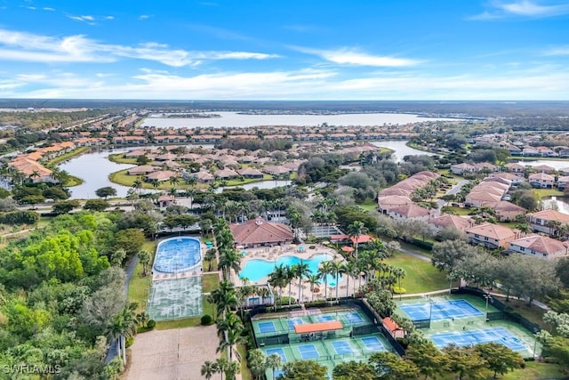 birds eye view of property featuring a water view