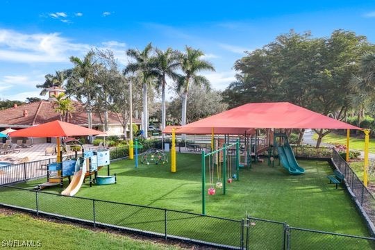 view of playground with a yard