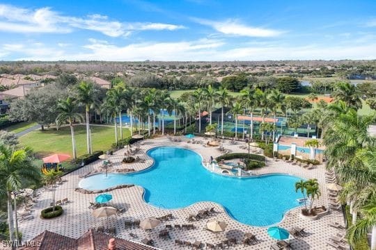 view of swimming pool with a patio