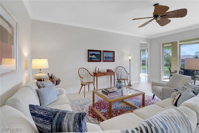 living room with crown molding, ceiling fan, and light tile patterned floors