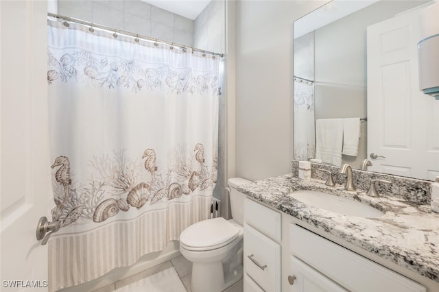 full bathroom with tile patterned floors, vanity, toilet, and shower / bath combo