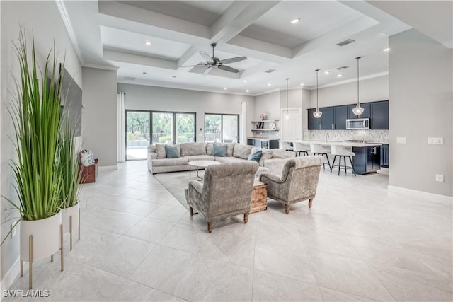 tiled living room featuring a high ceiling, coffered ceiling, ceiling fan, crown molding, and beam ceiling