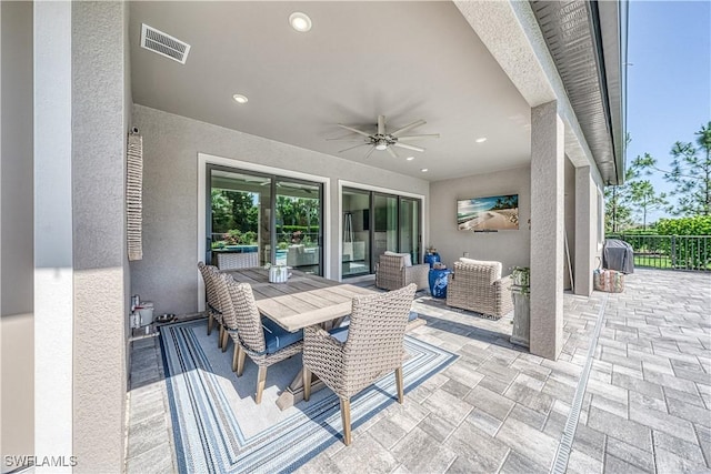 view of patio / terrace with ceiling fan