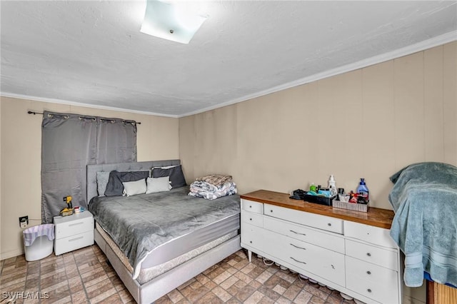 bedroom featuring crown molding