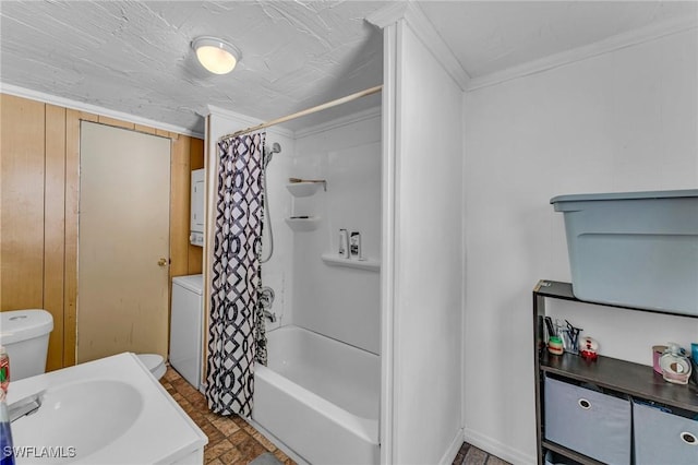 bathroom featuring sink, ornamental molding, and shower / bath combination with curtain