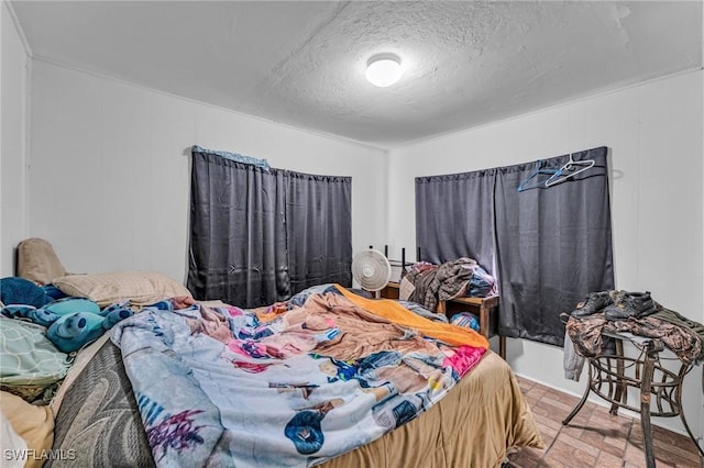 bedroom with a textured ceiling