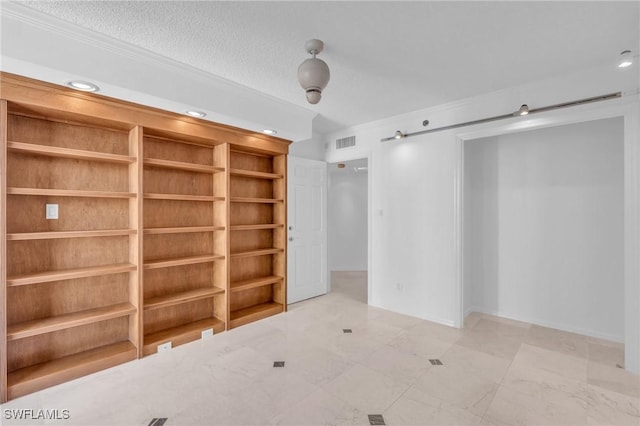 empty room with a textured ceiling