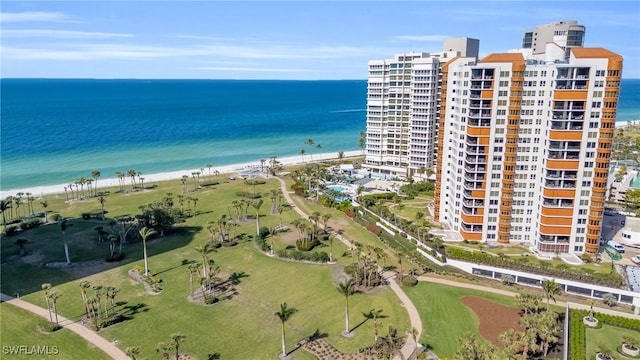 aerial view featuring a water view and a view of the beach