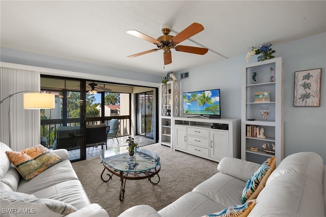 living room with carpet flooring and ceiling fan