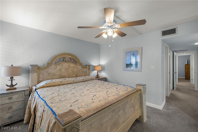 bedroom featuring ceiling fan and dark colored carpet