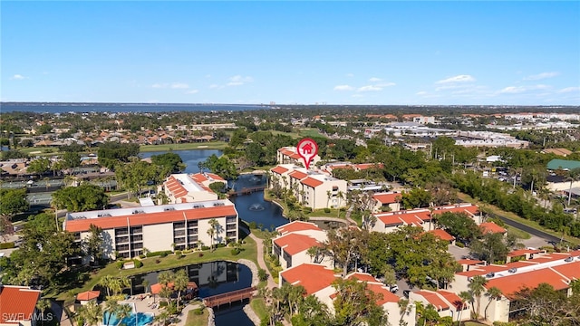 birds eye view of property featuring a water view